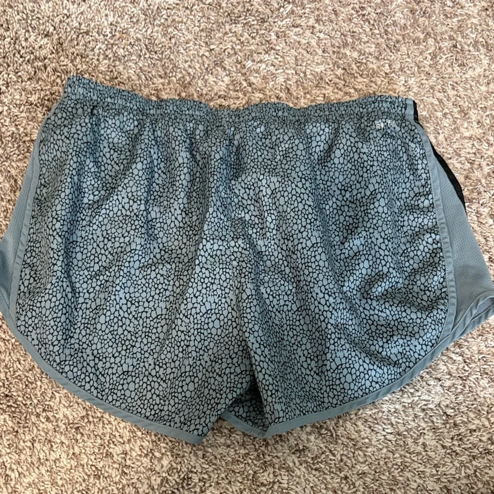 Nike Women's Teal Patterned Athletic Shorts with Black Accents
